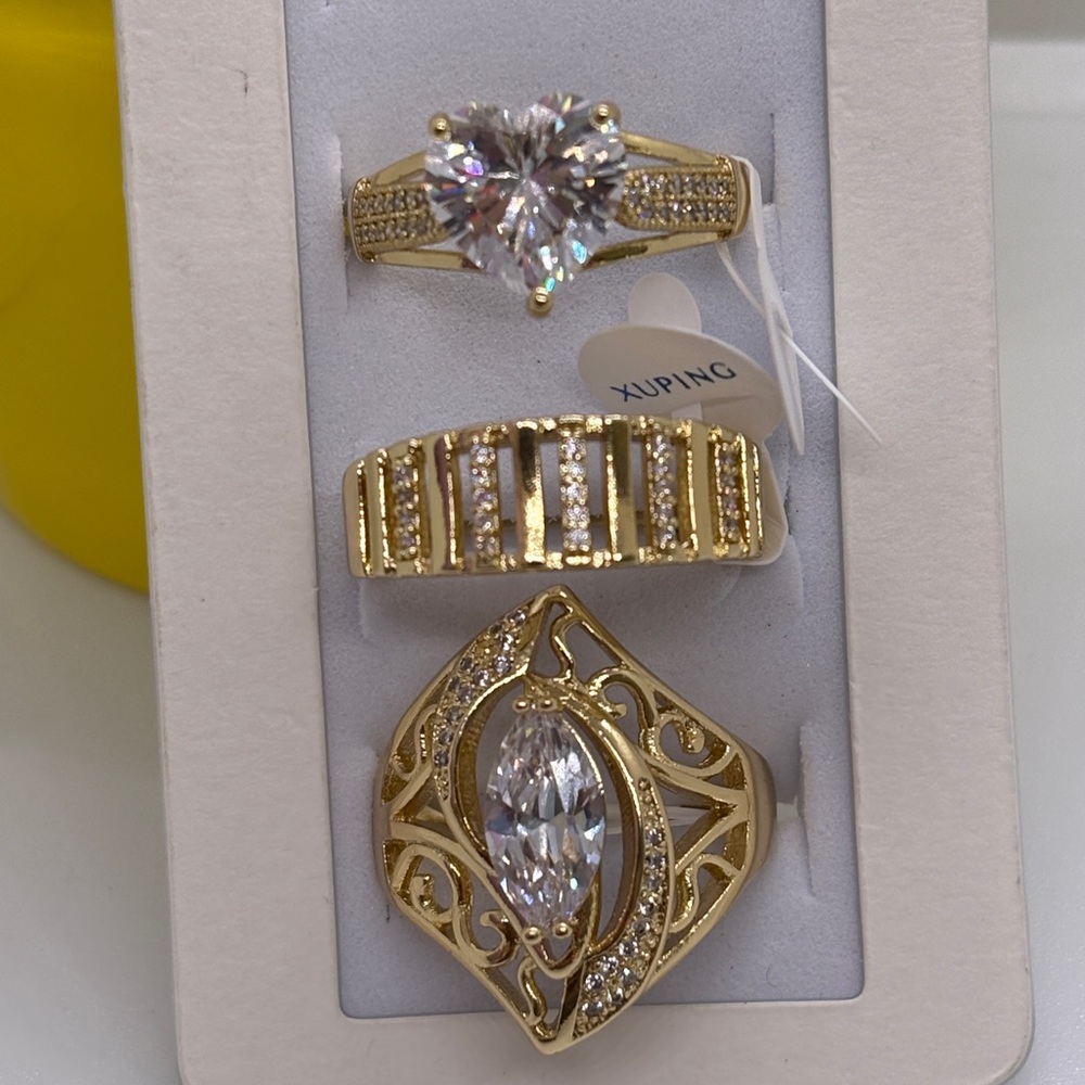 Trio of gold-plated rings